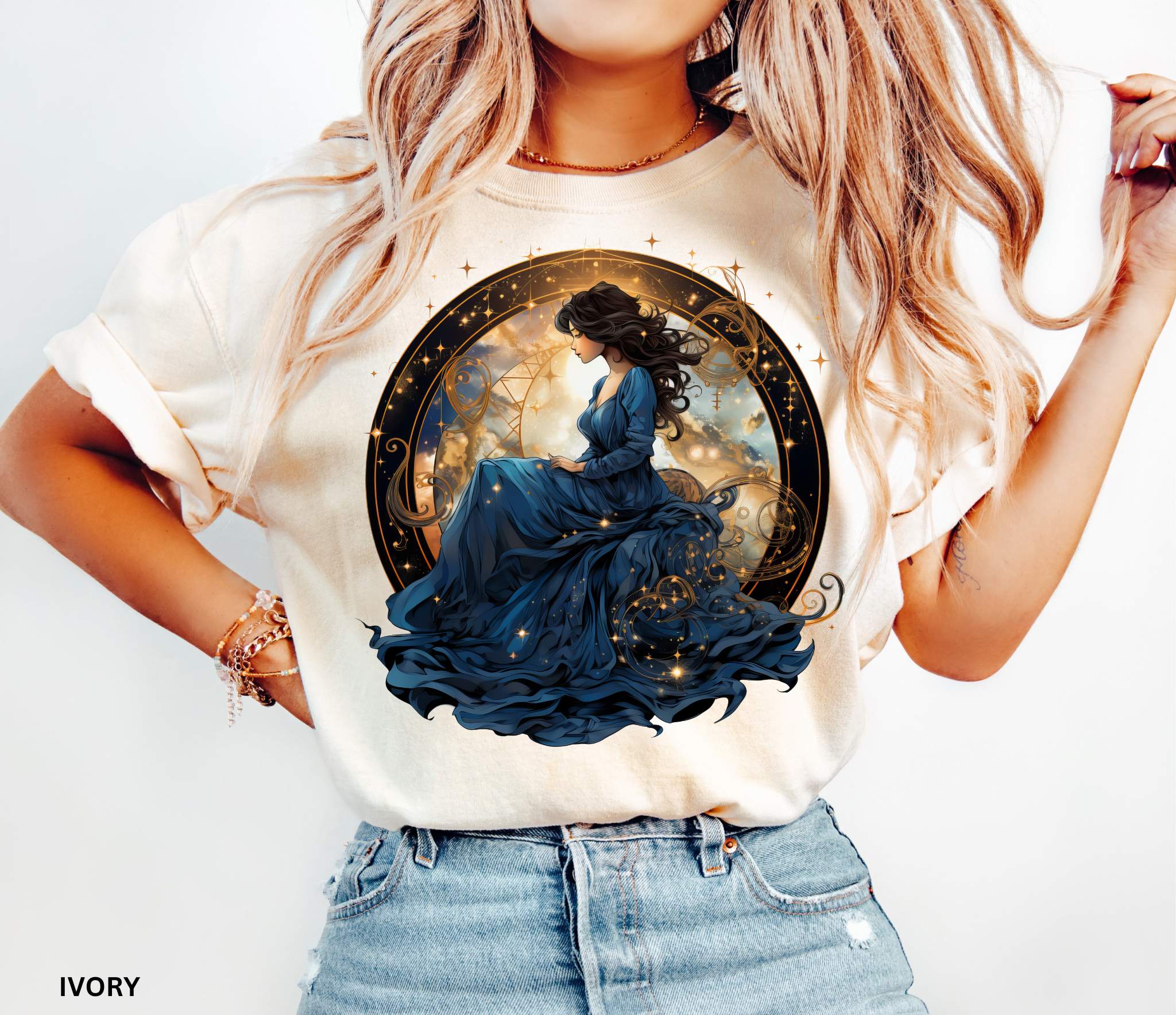 Celestial goddess in blue surrounded by gold constellations – witchcore shirt design