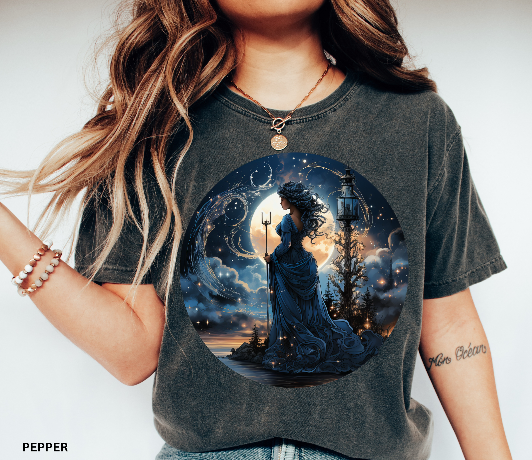 Celestial sea witch in flowing blue gown holding trident under glowing moon – witchcore shirt design