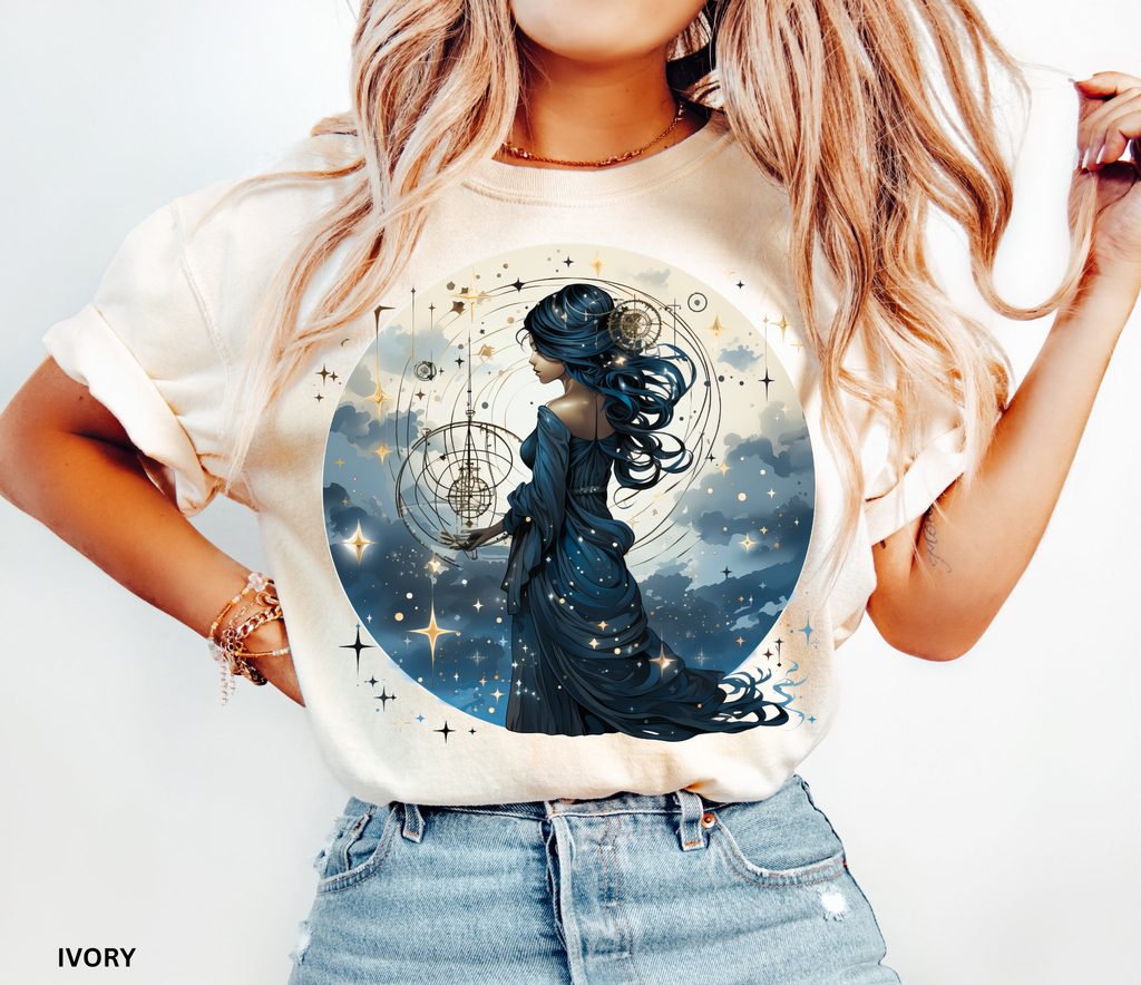 Celestial witch holding cosmic orbits surrounded by stars – witchcore shirt design