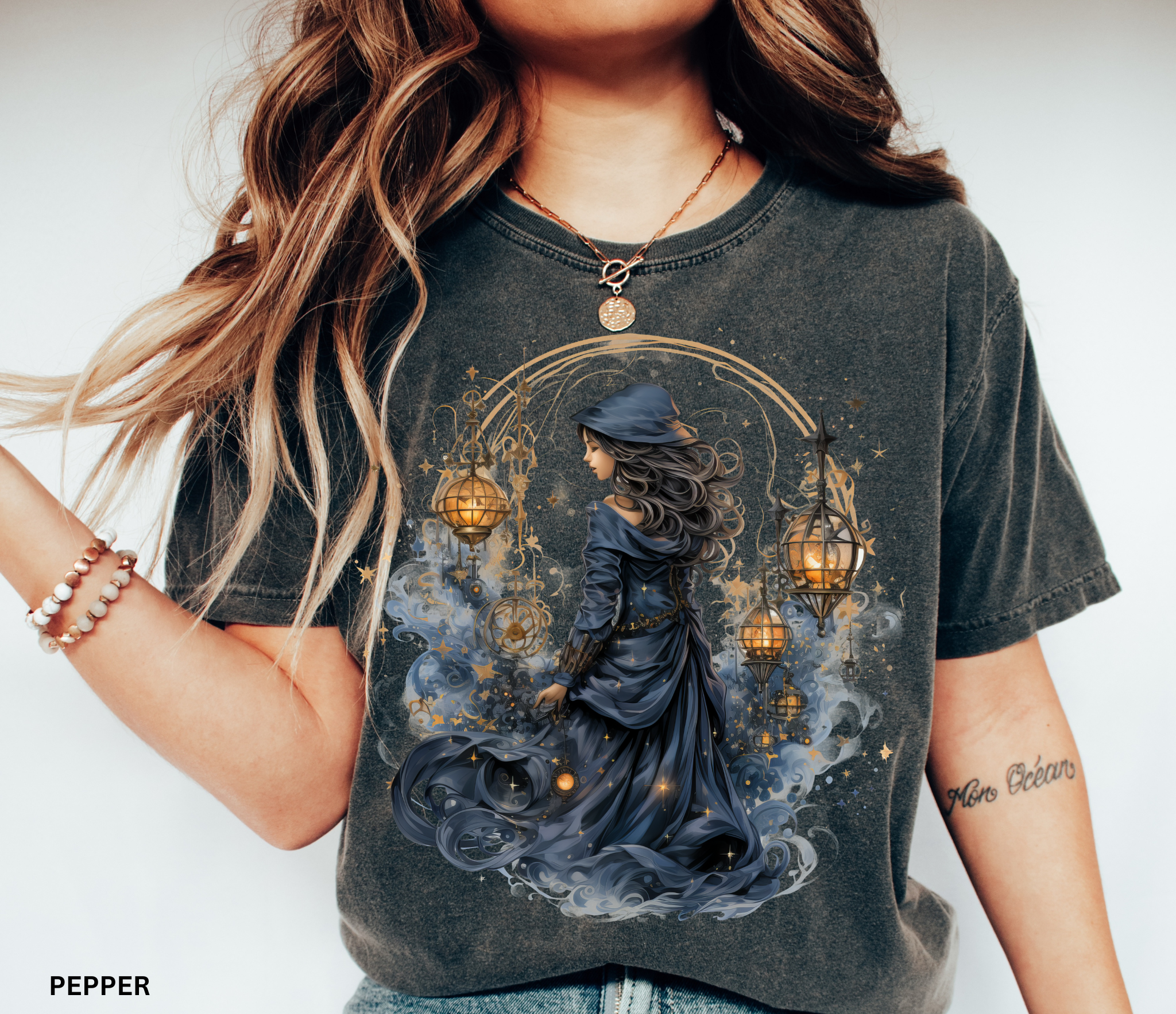 Celestial witch holding glowing lanterns surrounded by stars – witchcore fantasy shirt design