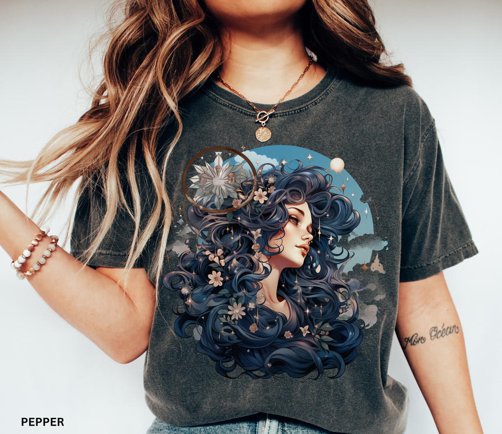 Celestial goddess with flowing blue hair and flowers surrounded by stars – witchcore fantasy shirt design