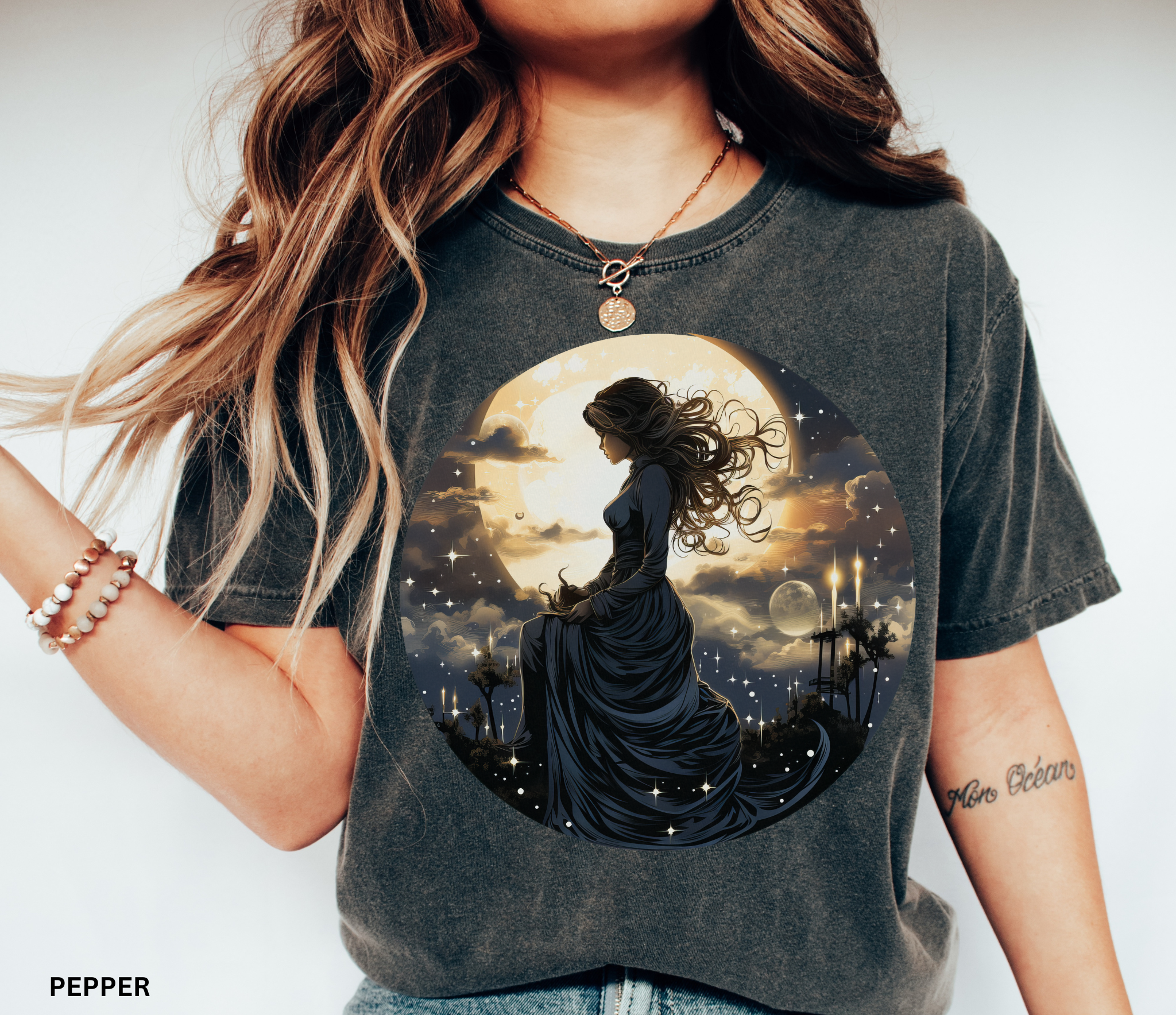 Celestial witch holding crescent moon beneath glowing sky – witchcore fantasy shirt design