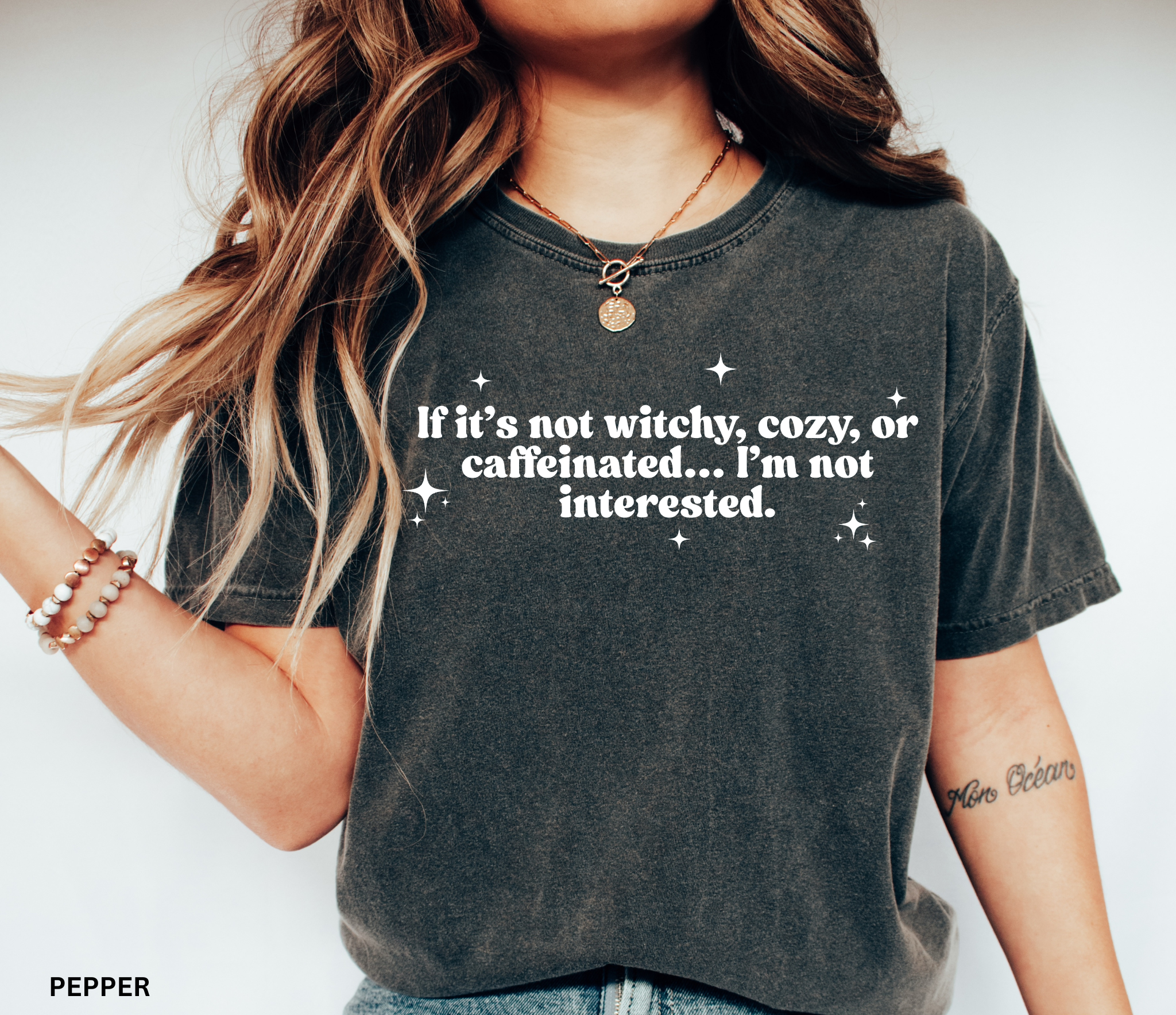 Funny witchy coffee lover shirt reading “If it’s not witchy, cozy, or caffeinated, I’m not interested” — witch aesthetic tee on Comfort Colors fabric.