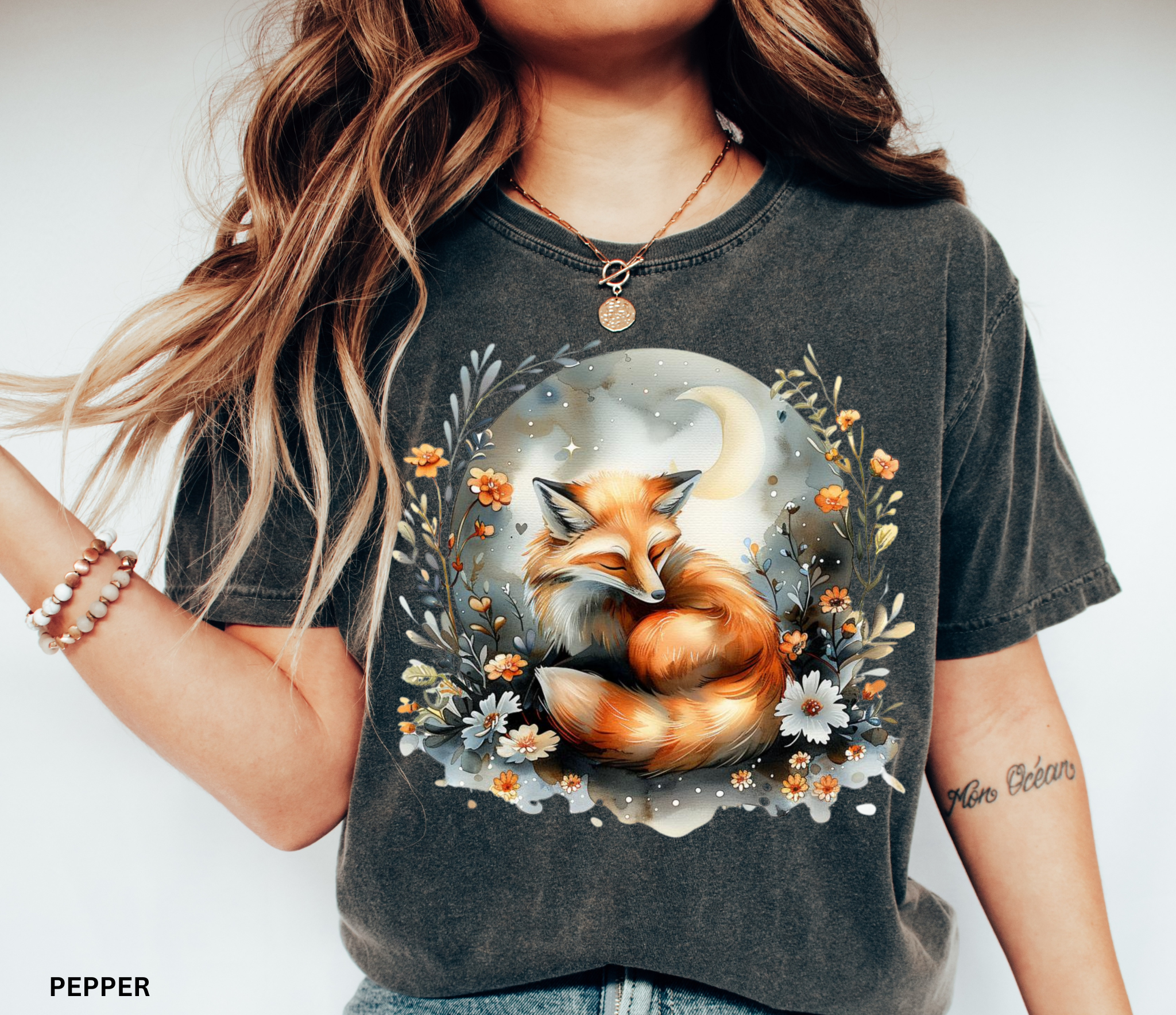 Sleeping fox surrounded by flowers and a crescent moon — cozy cottagecore forestcore design on soft Comfort Colors shirt.