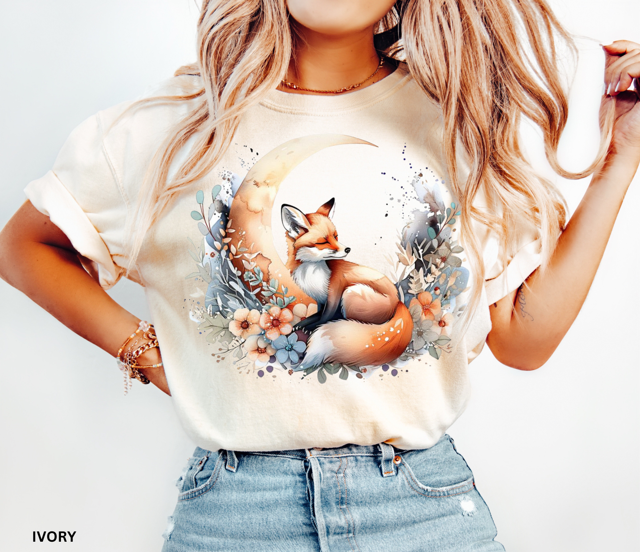 Cottagecore design of a fox sleeping beneath a crescent moon surrounded by pastel flowers and forest leaves.