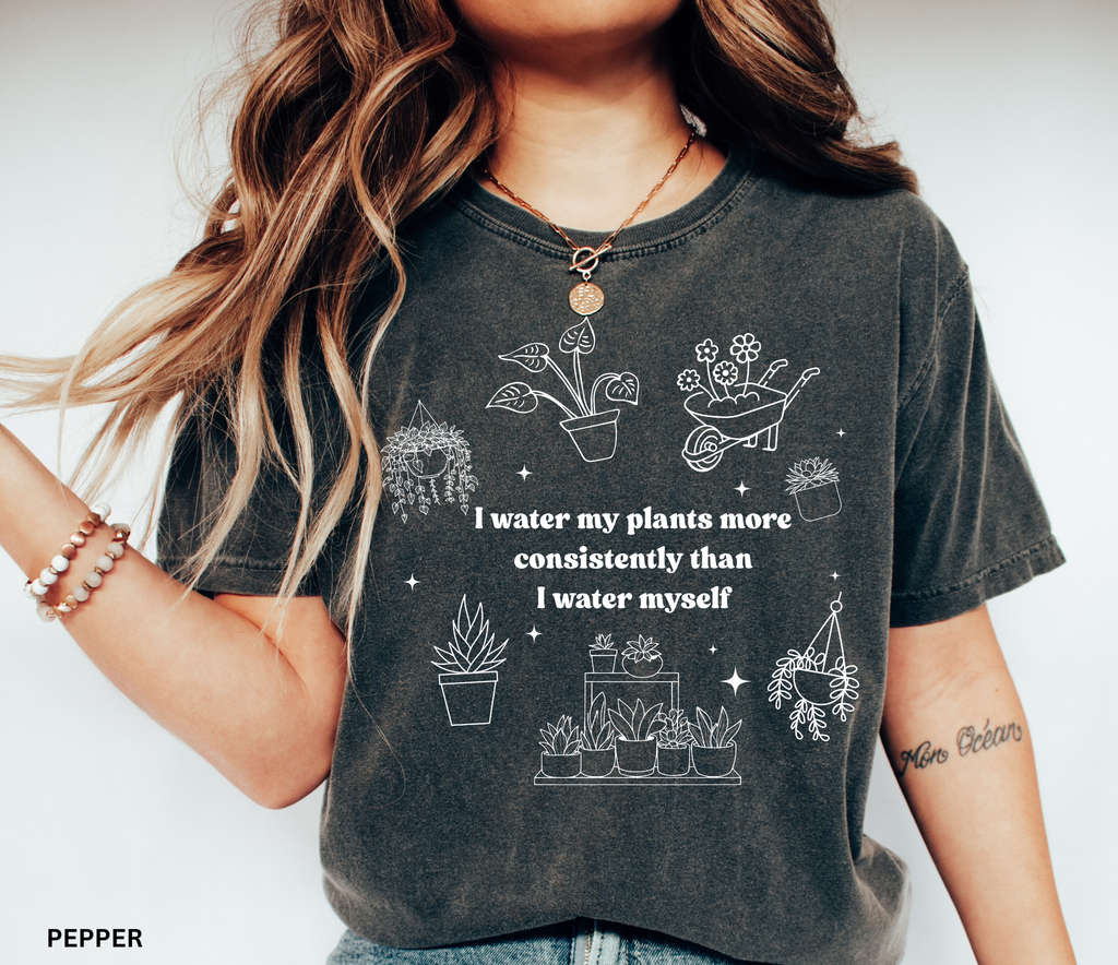 Funny plant shirt design with potted plants and text “I water my plants more consistently than I water myself.”
