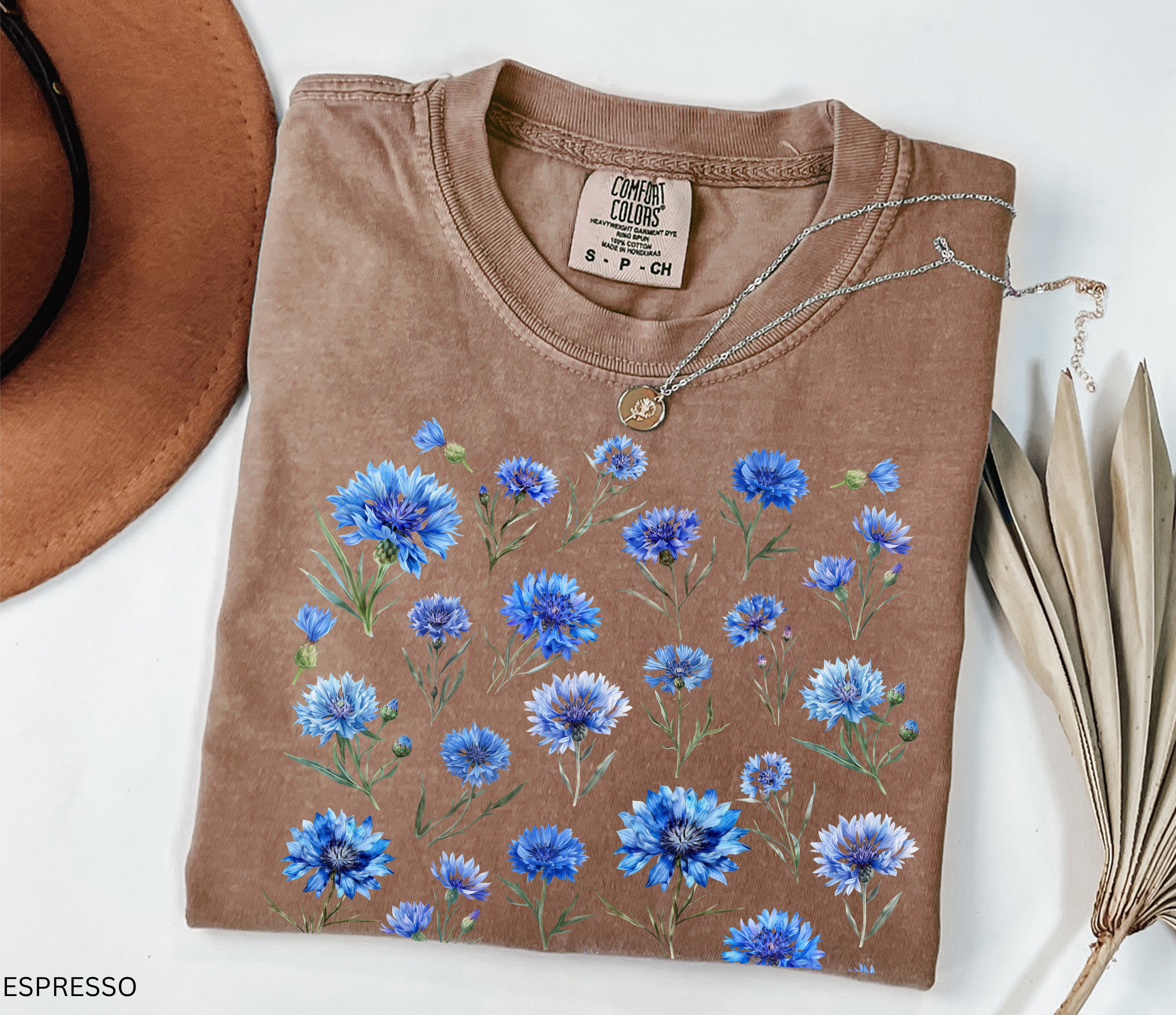 Hand-drawn blue cornflower floral shirt design, Nordic meadow aesthetic with delicate botanical blooms.