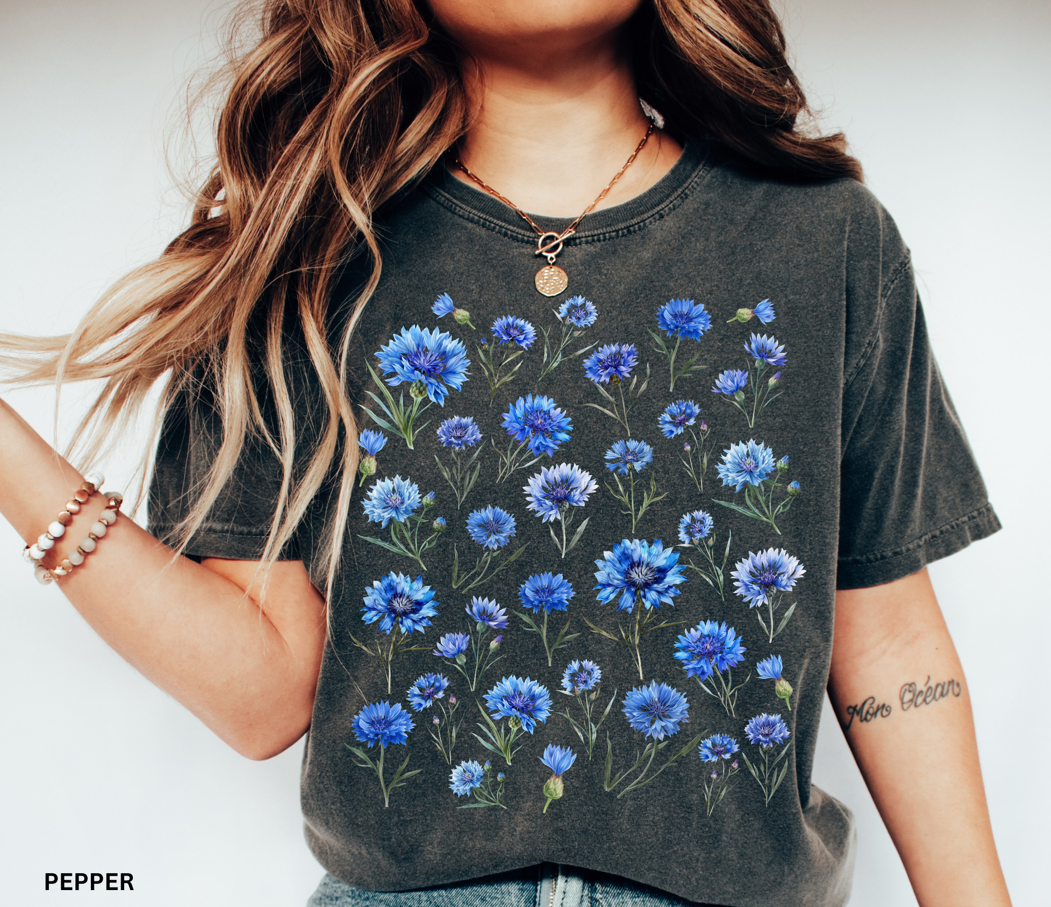 Hand-drawn blue cornflower floral shirt design, Nordic meadow aesthetic with delicate botanical blooms.