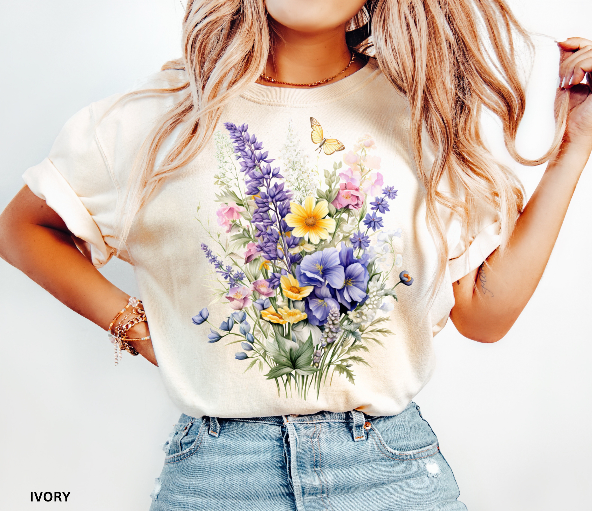 Cottagecore floral shirt design featuring watercolor-style wildflowers and a butterfly, soft botanical vintage aesthetic