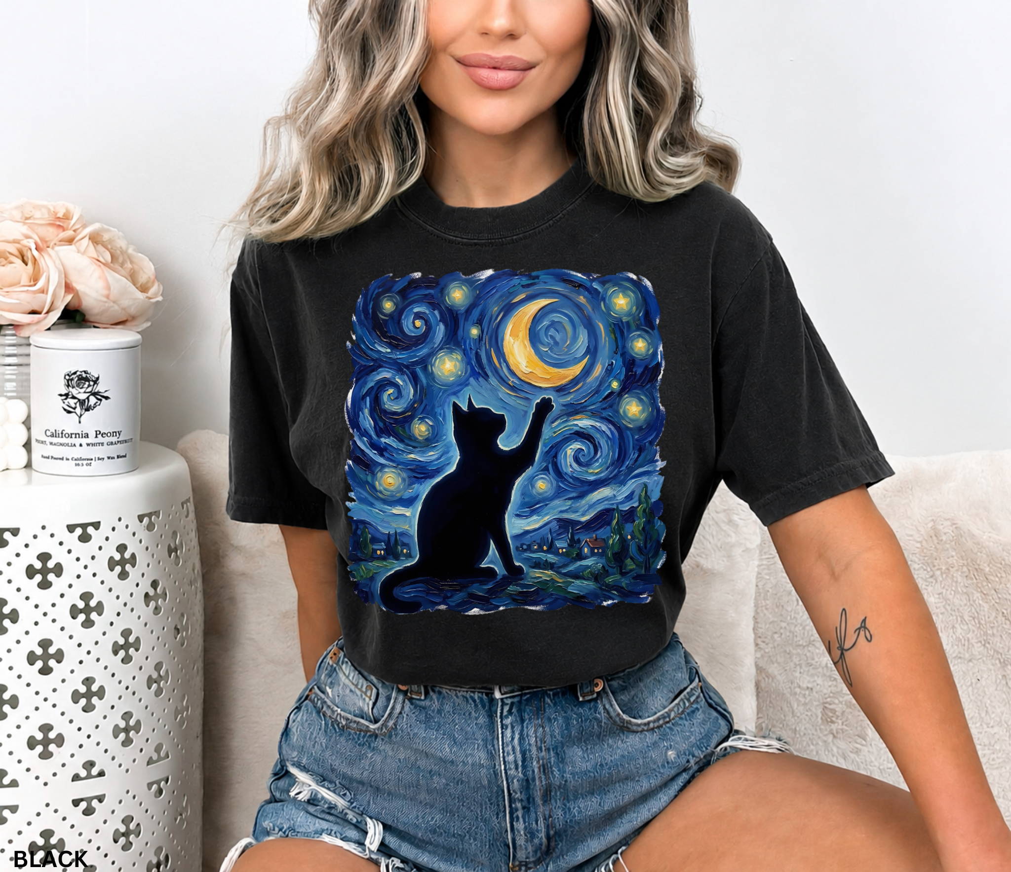 Whimsical black cat illustration reaching toward a glowing crescent moon beneath a swirling blue starry night sky. Celestial cottagecore artwork featuring stars, moonlight, and magical cat aesthetic.