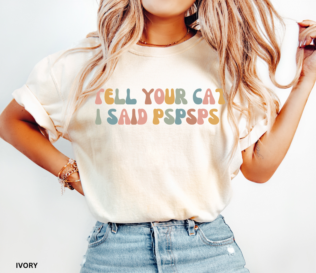 Colorful retro typography shirt featuring the phrase "Tell Your Cat I Said Pspsps," designed for cat lovers, cat moms, and pet enthusiasts.