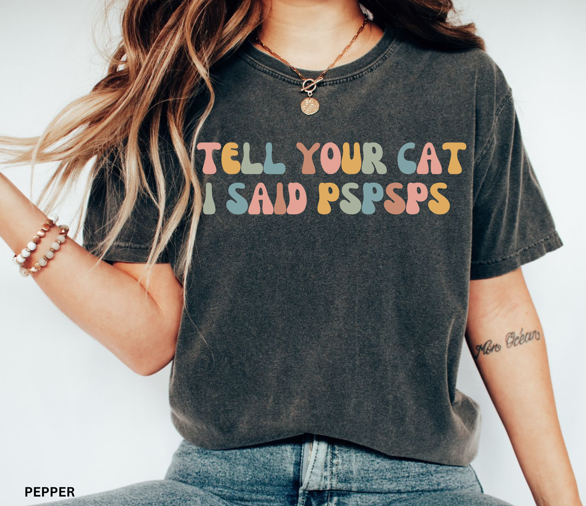 Colorful retro typography shirt featuring the phrase "Tell Your Cat I Said Pspsps," designed for cat lovers, cat moms, and pet enthusiasts.