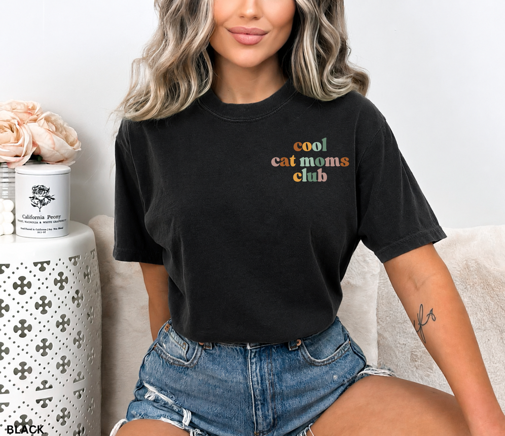 Cute "Cool Cat Moms Club" retro typography graphic t-shirt featuring pastel lettering for cat moms and cat lovers.