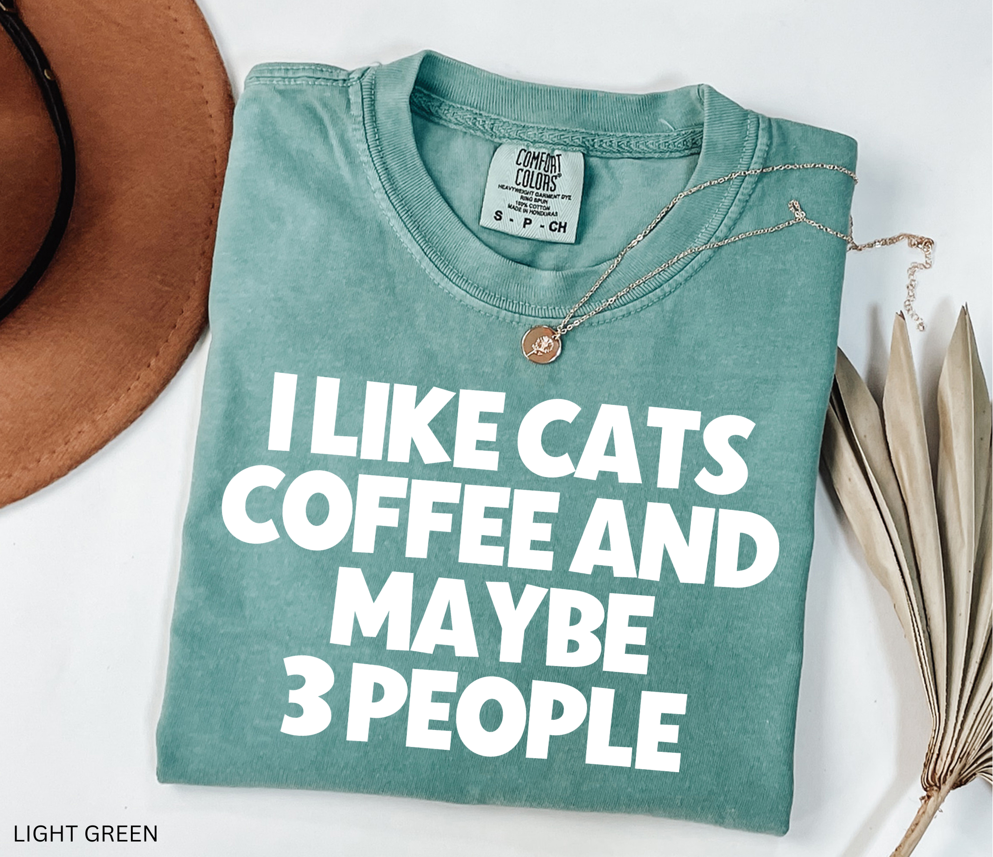 Funny "I Like Cats, Coffee and Maybe 3 People" graphic t-shirt for cat lovers, coffee lovers and introverts with bold minimalist typography.
