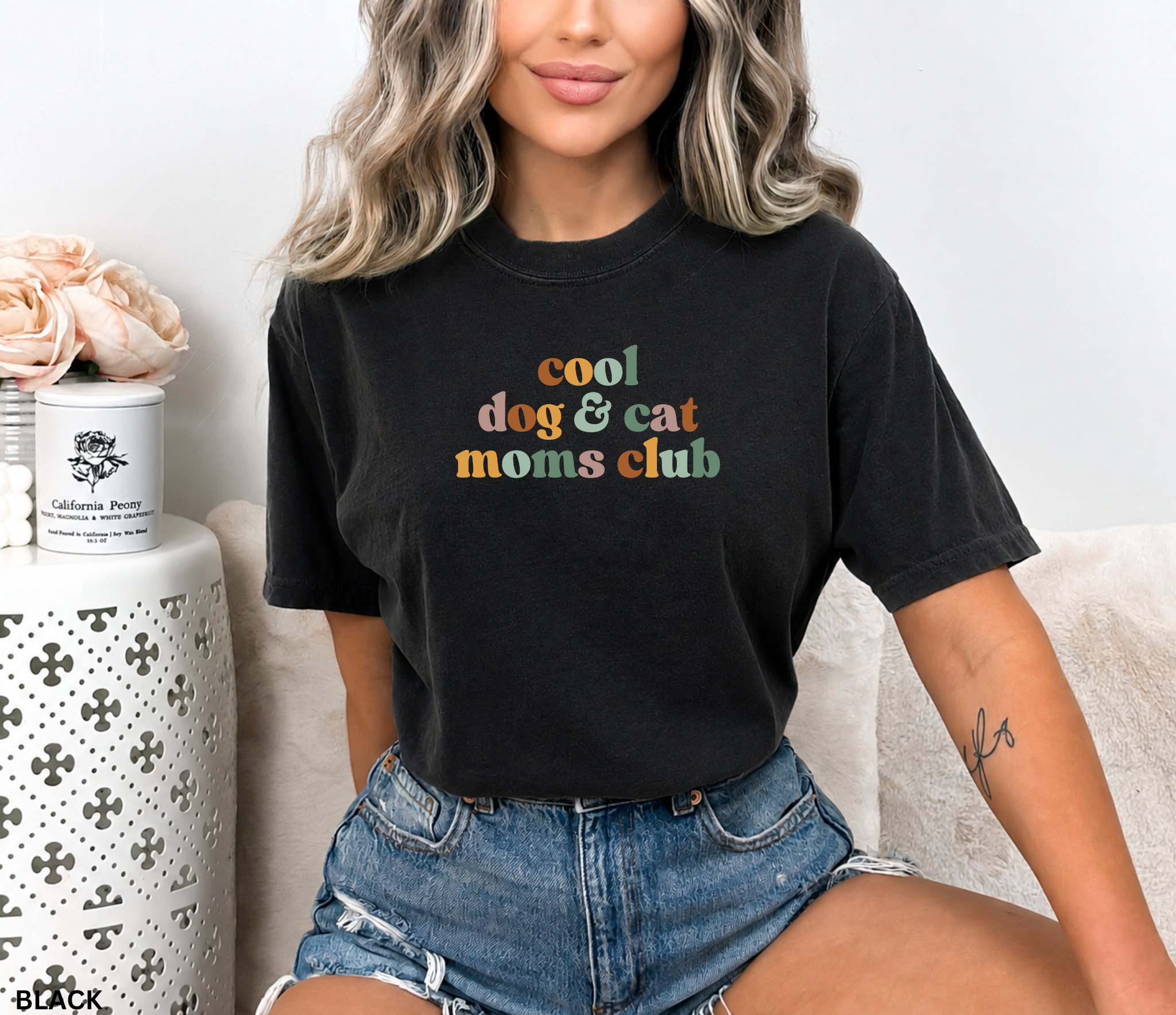 Retro "Cool Dog & Cat Moms Club" graphic t-shirt featuring colorful vintage lettering for dog moms, cat moms, and proud pet lovers.