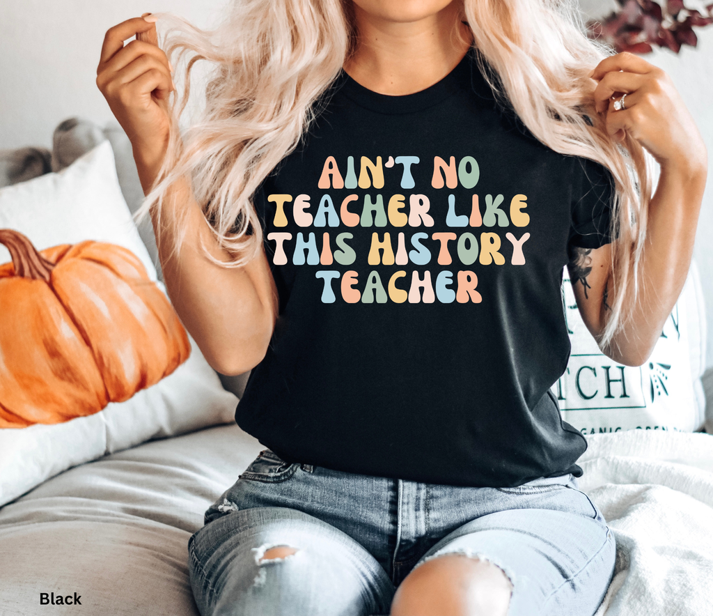 Retro history teacher graphic t-shirt featuring a colourful “Ain’t No Teacher Like This History Teacher” design.