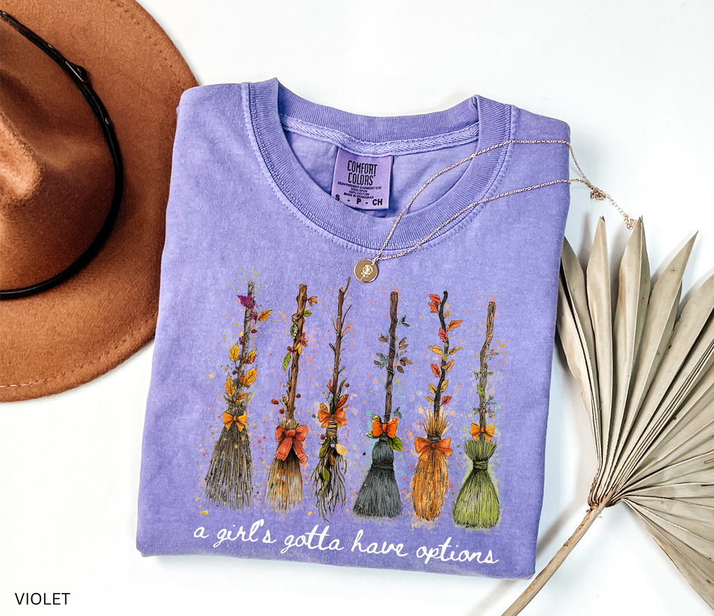 Funny Halloween witch broom shirt with quote A Girl’s Gotta Have Options