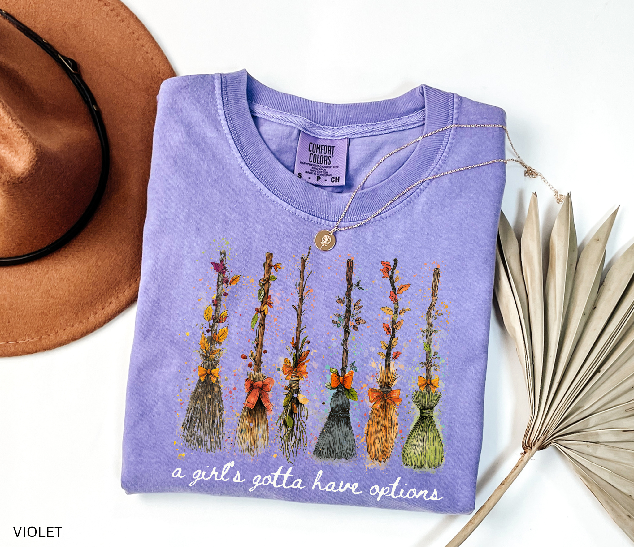 Funny Halloween witch broom shirt with quote A Girl’s Gotta Have Options