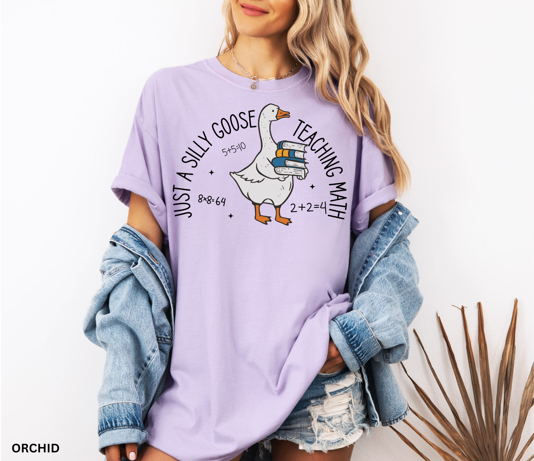 Funny math teacher shirt with a goose holding books, perfect teacher gift or classroom tee