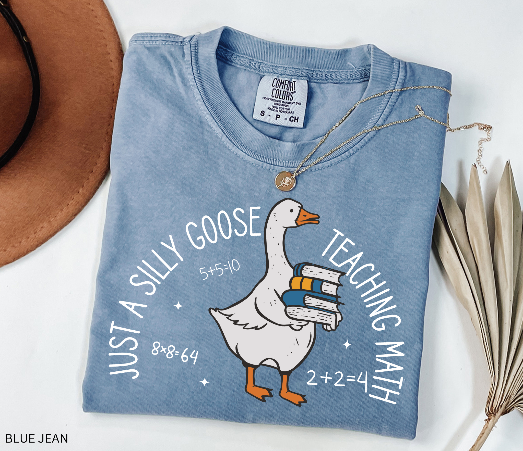 Funny math teacher shirt with a goose holding books, perfect teacher gift or classroom tee