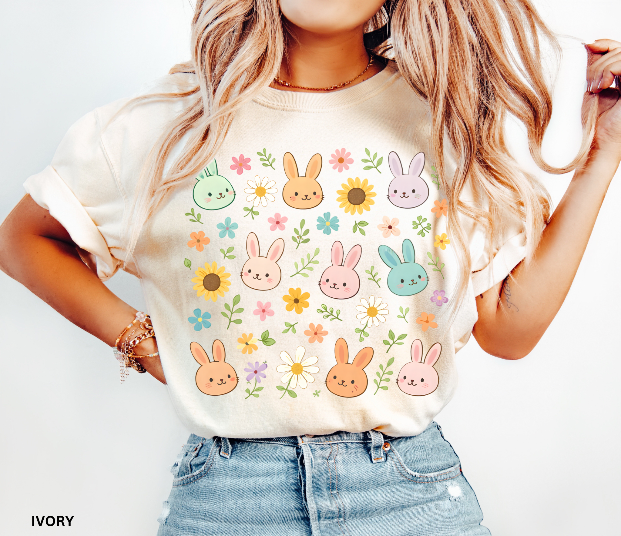 Floral cottagecore bunny shirt with pastel rabbits and wildflowers on a dark background, whimsical woodland aesthetic