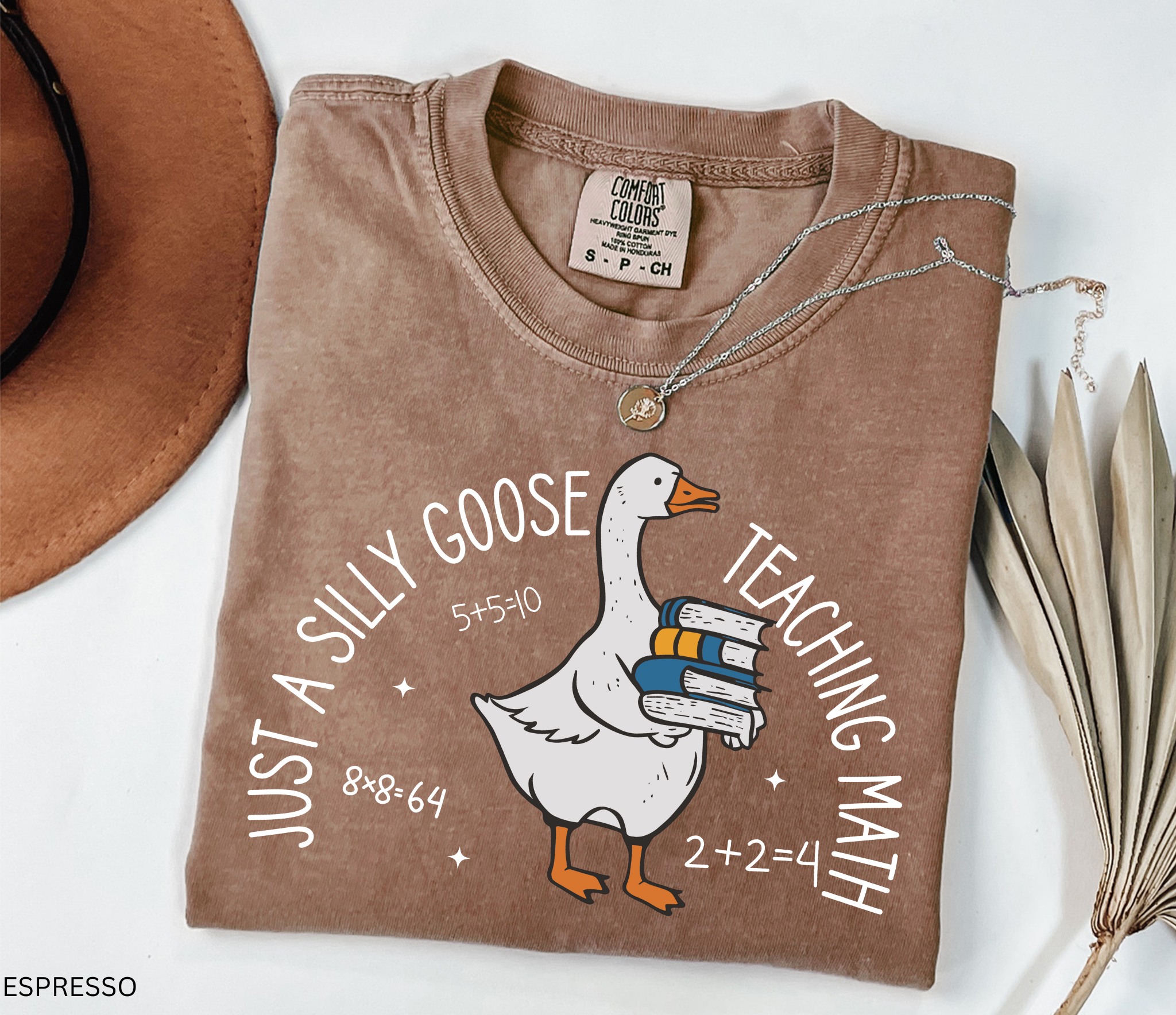 Funny math teacher shirt with a goose holding books, perfect teacher gift or classroom tee