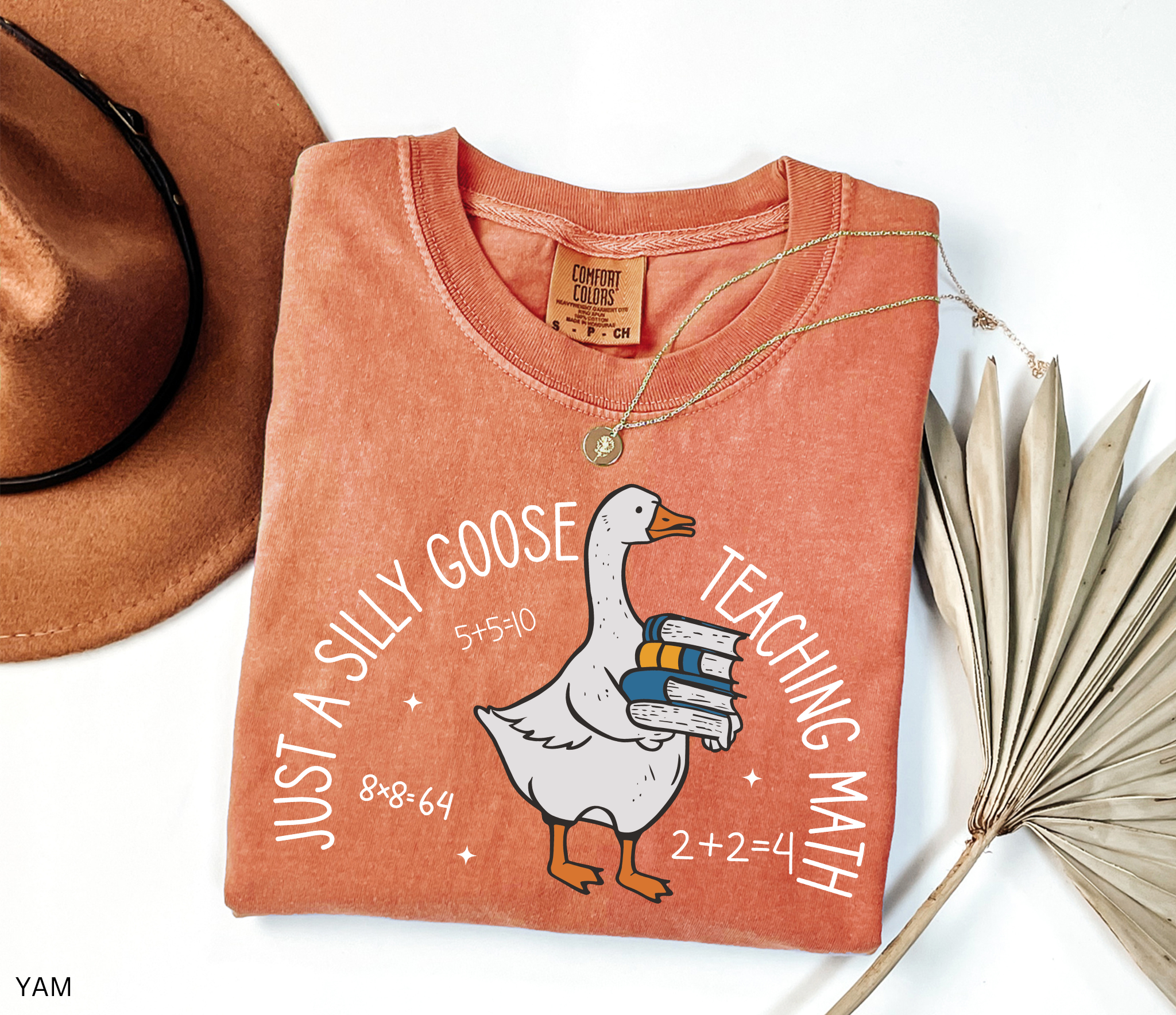 Funny math teacher shirt with a goose holding books, perfect teacher gift or classroom tee