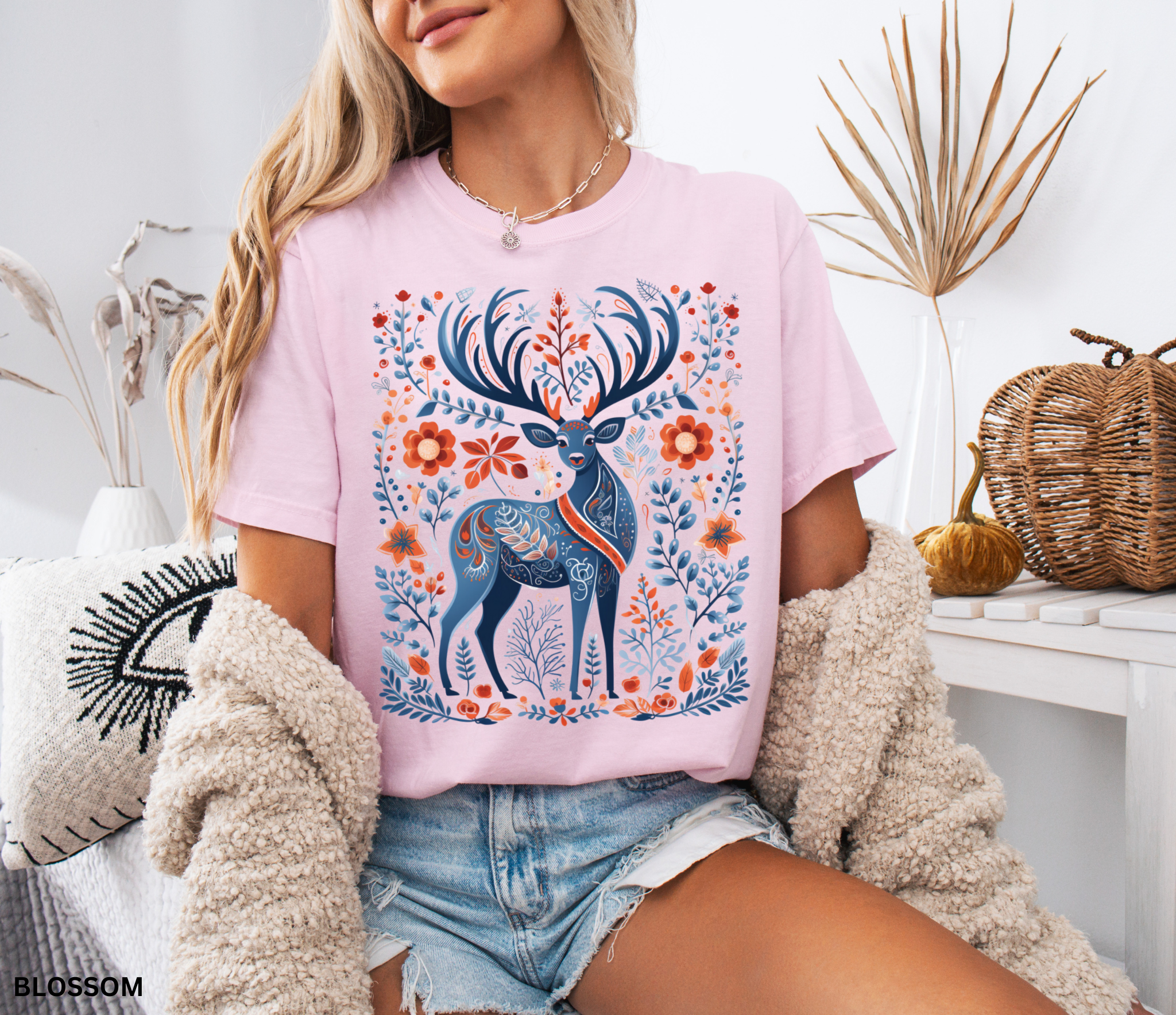 Nordic folk art stag with ornate antlers surrounded by flowers and woodland botanicals in a cottagecore forest design