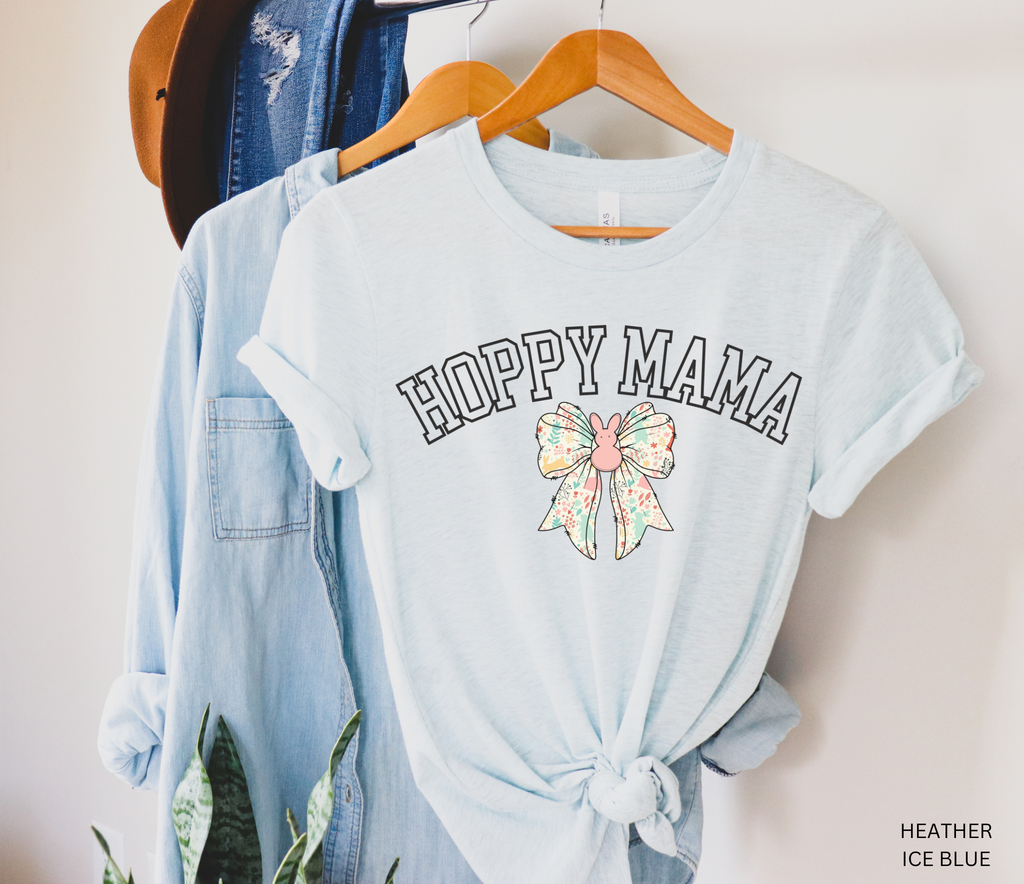 Hoppy Mama Easter shirt with pastel floral bunny bow design on a black background