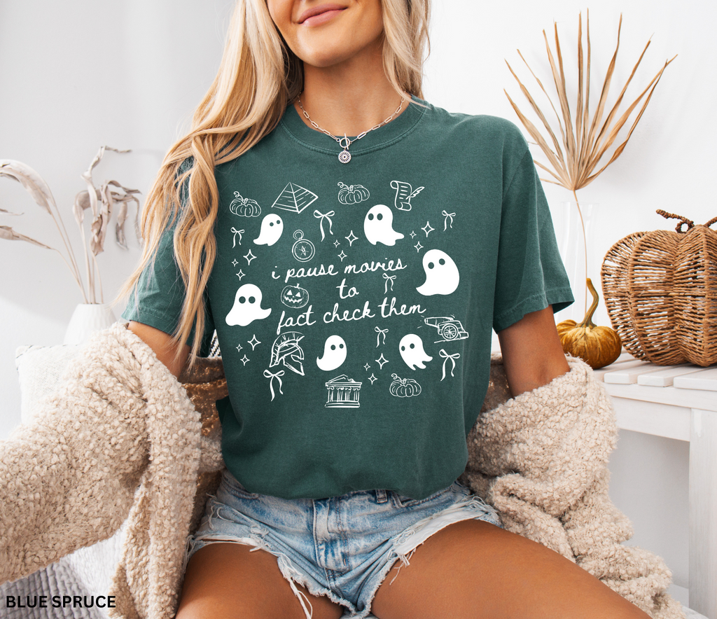 Halloween history teacher shirt with doodle-style ghosts and history-themed elements. Funny spooky season tee for teachers and classrooms.