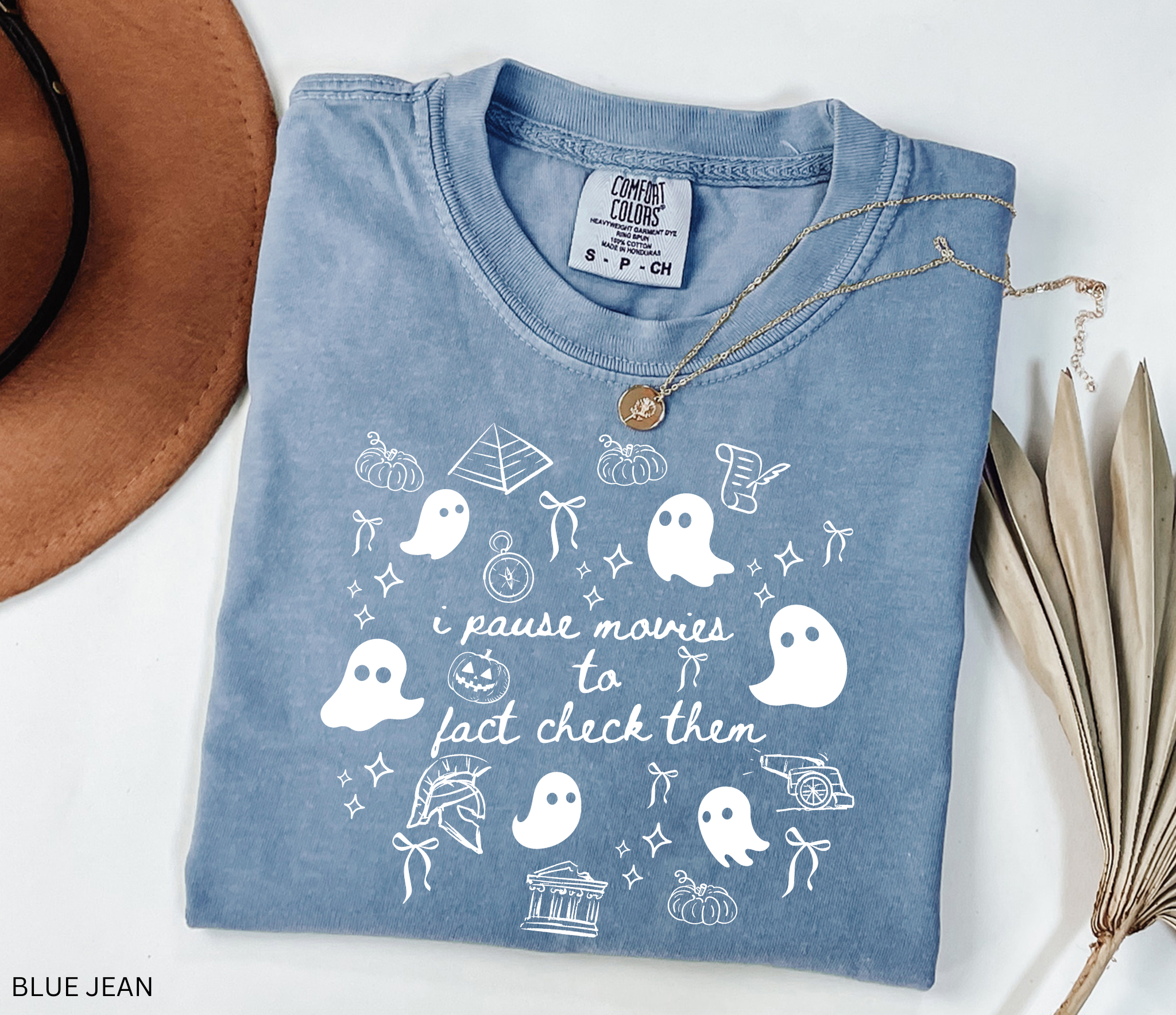 Halloween history teacher shirt with doodle-style ghosts and history-themed elements. Funny spooky season tee for teachers and classrooms.