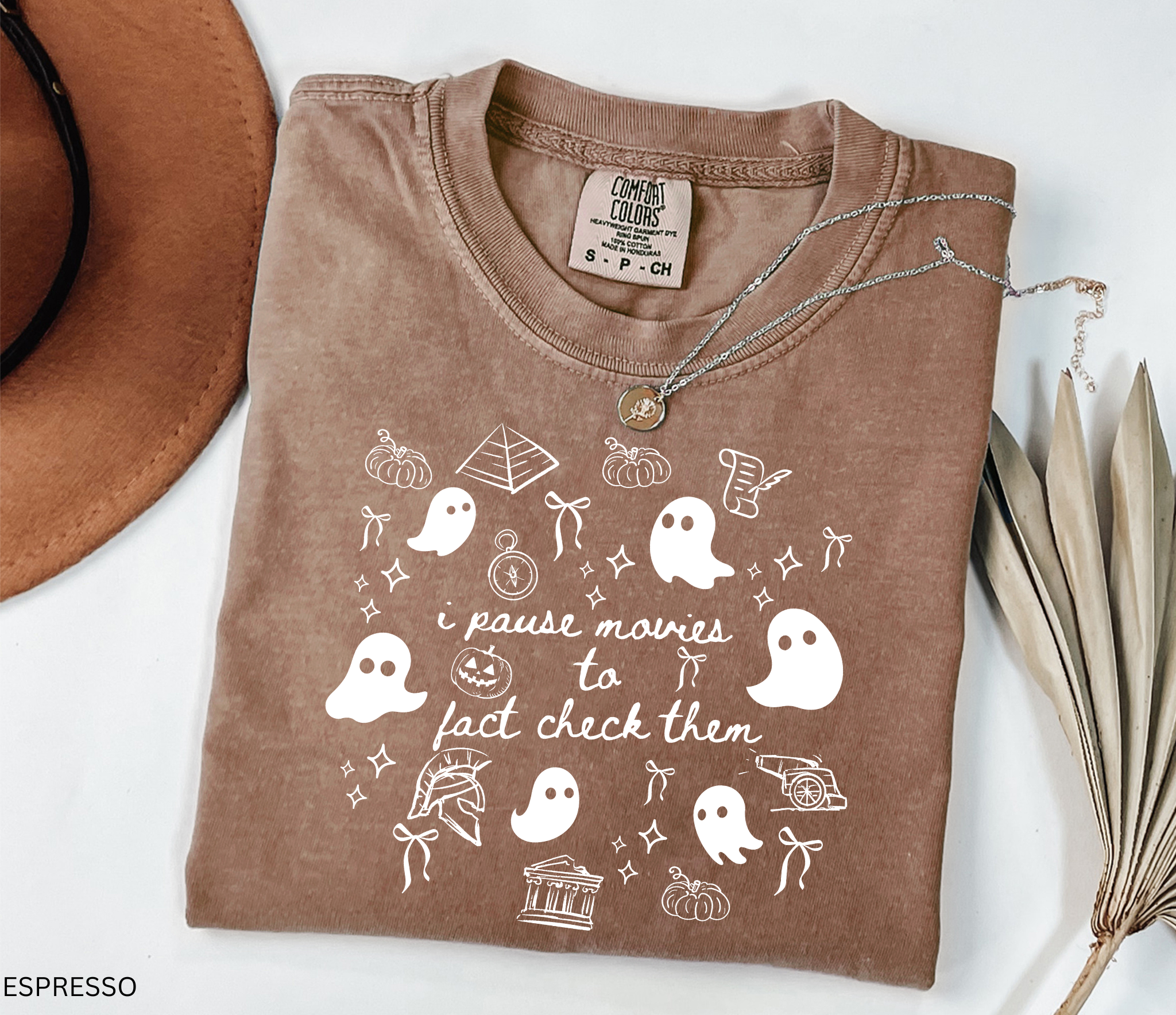 Halloween history teacher shirt with doodle-style ghosts and history-themed elements. Funny spooky season tee for teachers and classrooms.