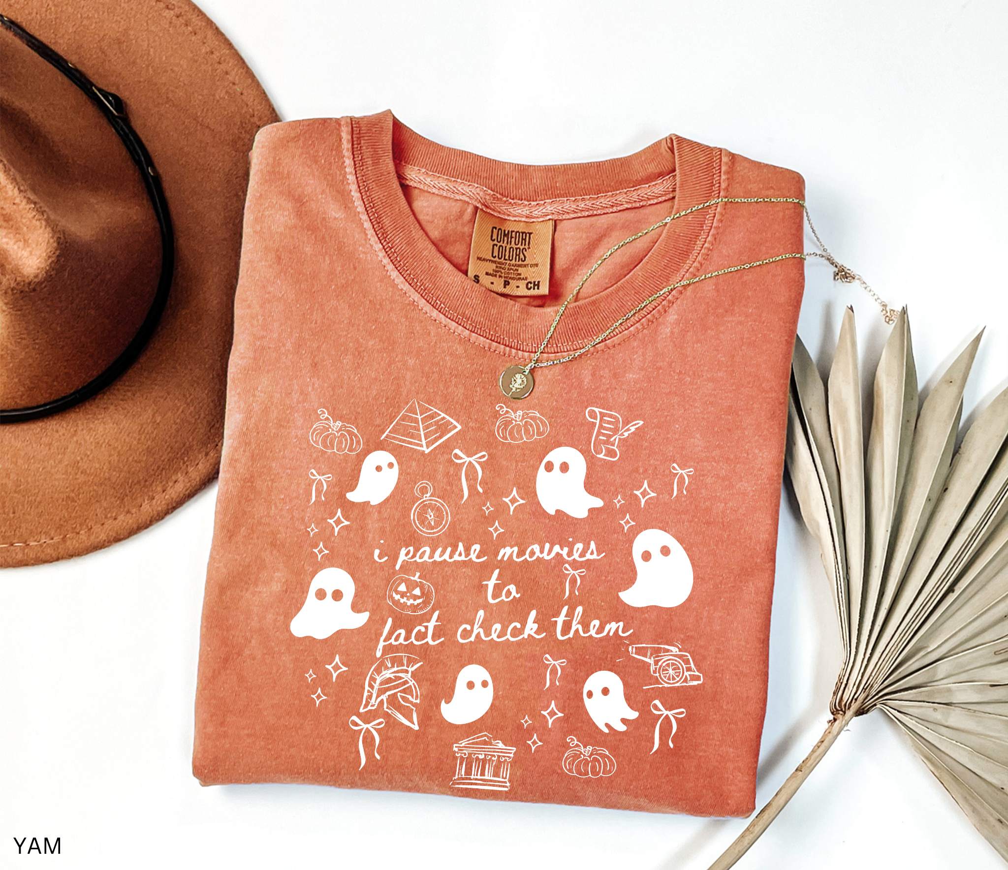 Halloween history teacher shirt with doodle-style ghosts and history-themed elements. Funny spooky season tee for teachers and classrooms.