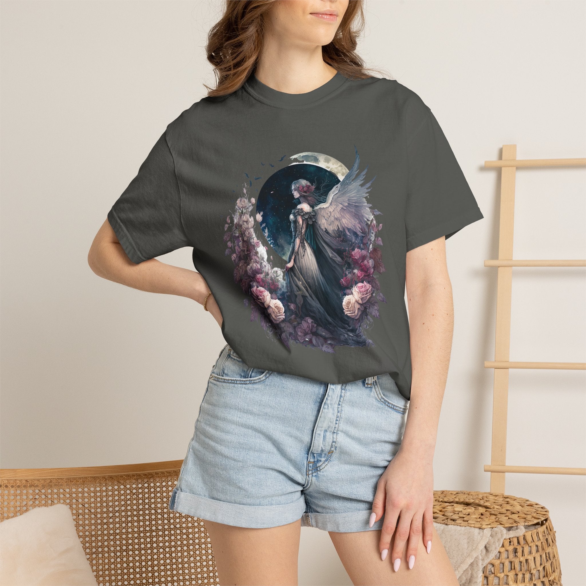 Celestial Angel Moon Graphic Tee on Comfort Colors pepper t-shirt featuring a winged angel beneath a full moon with blooming roses, perfect for fairycore, cottagecore, celestial, and witchy fashion.